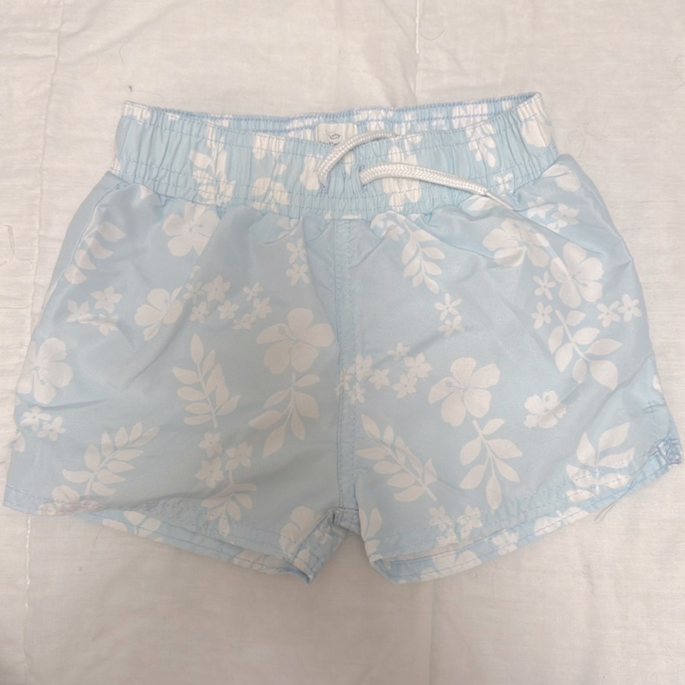 Blue and White Tropical Print Swim Trunks